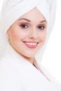 Smiley woman in white bathrobe Royalty Free Stock Photo