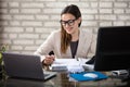 Smiling Accountant Using Calculator Royalty Free Stock Photo