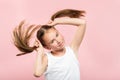 Smiling adolescent girl pig tails hair carefree Royalty Free Stock Photo