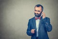 Man talking on mobile phone looking and smiling Royalty Free Stock Photo