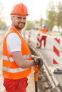 Smiling adult construction worker