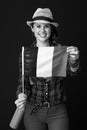 Smiling adventure tourist woman showing flag of France