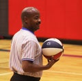 Smiling African American basketball referee