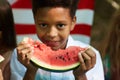 Smiling African-American Boy Eating Watermelon Royalty Free Stock Photo