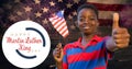 Smiling African American Boy Holding Usa Flag Showing Thumbs Up By Martin Luther King Jr Day