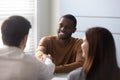 Smiling african american candidate shaking hands with businessman recruiter. Royalty Free Stock Photo