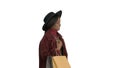 Smiling African american fashion girl in coat and black hat posi Royalty Free Stock Photo