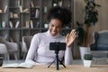 Smiling African American woman talk on webcam call on cellphone Royalty Free Stock Photo