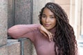 Smiling african american female young adult with braids Royalty Free Stock Photo