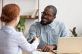 Smiling African American hr manager shaking hand of candidate Royalty Free Stock Photo