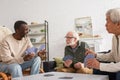 Smiling african american man holding playing Royalty Free Stock Photo