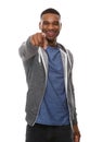 Smiling african american man pointing finger