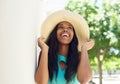 Smiling african american model with sun hat Royalty Free Stock Photo