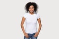 Smiling African American woman in white t-shirt front mock up