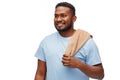 Smiling african american young man with bath towel Royalty Free Stock Photo