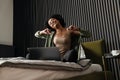 Smiling african american young woman using laptop Royalty Free Stock Photo