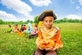 Smiling African boy in pirate costume and pumpkin Royalty Free Stock Photo