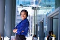 Smiling african business woman with arms crossed Royalty Free Stock Photo