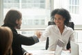 Smiling african businesswoman and caucasian businessman shaking Royalty Free Stock Photo