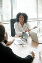 Smiling african businesswoman sharing good result meeting partne Royalty Free Stock Photo