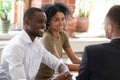 Smiling african hr managers listening to applicant at job interview Royalty Free Stock Photo