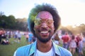 Smiling African man in holi colors