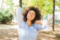 Smiling African Young Woman Dreaming With Closed Eyes In Nature Royalty Free Stock Photo