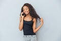Smiling afro american woman talking on the phone Royalty Free Stock Photo
