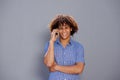 Smiling afro man talking on mobile phone Royalty Free Stock Photo