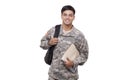 Smiling American soldier with documents and backpack Royalty Free Stock Photo