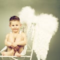 Smiling angel kid Royalty Free Stock Photo