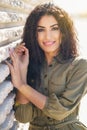 Young Arab Woman with curly hair outdoors Royalty Free Stock Photo