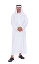 Smiling arabian man standing over white background