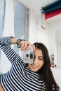 smiling armenian woman in striped pullover