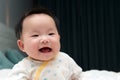 Smiling Asian baby