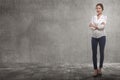 Smiling asian business woman with folded arms in the street Royalty Free Stock Photo