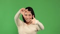 Smiling asian business woman making frame with fingers, attractive young asian happy woman Royalty Free Stock Photo