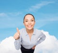 Smiling asian businesswoman showing thumbs up Royalty Free Stock Photo