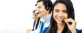 Smiling Asian call center or telemarketer team Royalty Free Stock Photo