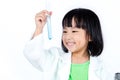 Smiling Asian Chinese Little Girl Examining Test Tube With Uniform Royalty Free Stock Photo