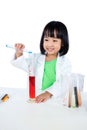 Smiling Asian Chinese Little Girl Examining Test Tube With Uniform Royalty Free Stock Photo