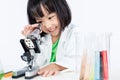 Smiling Asian Chinese Little Girl Working With Microscope