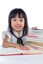 Smiling Asian Chinese little office lady reading book Royalty Free Stock Photo