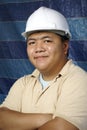 Smiling asian contractor