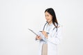 Asian female doctor woman in white medical gown hold clipboard isolated on white background Royalty Free Stock Photo