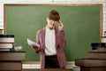 Smiling asian female teacher ready to teach Royalty Free Stock Photo