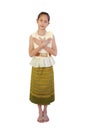 Smiling Asian girl in traditional Thai costume dress with making love gesture on white background. Image with clipping path and Royalty Free Stock Photo