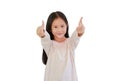 Smiling Asian little child girl child pointing at you and looking camera isolated on blue background. Kid point two index fingers Royalty Free Stock Photo