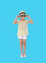 Smiling asian little girl wearing sunglasses and straw hat isolated on light blue background with clipping path. Summer and Royalty Free Stock Photo