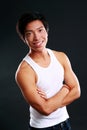 Smiling asian man with arms folded Royalty Free Stock Photo